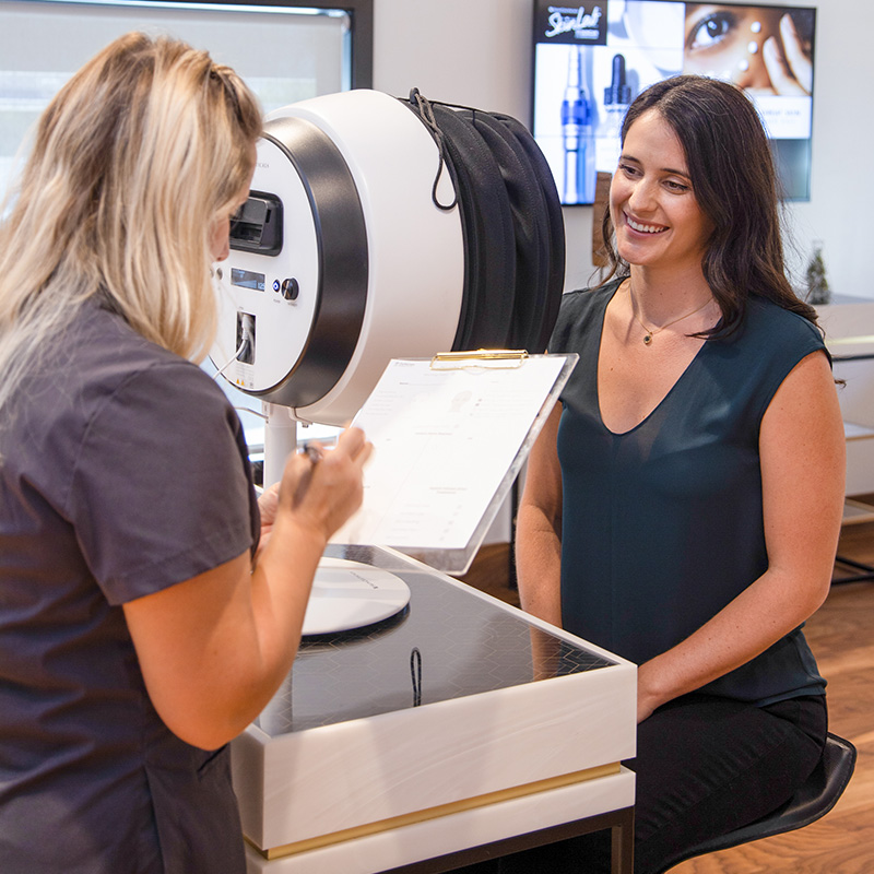 Woman Having Skin Consultation